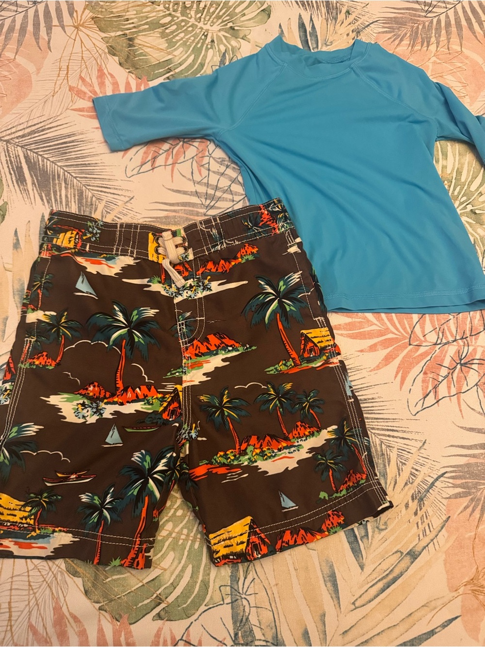 2 piece bundle blue Rash Guard and tropical swimming trunks Set size 4T